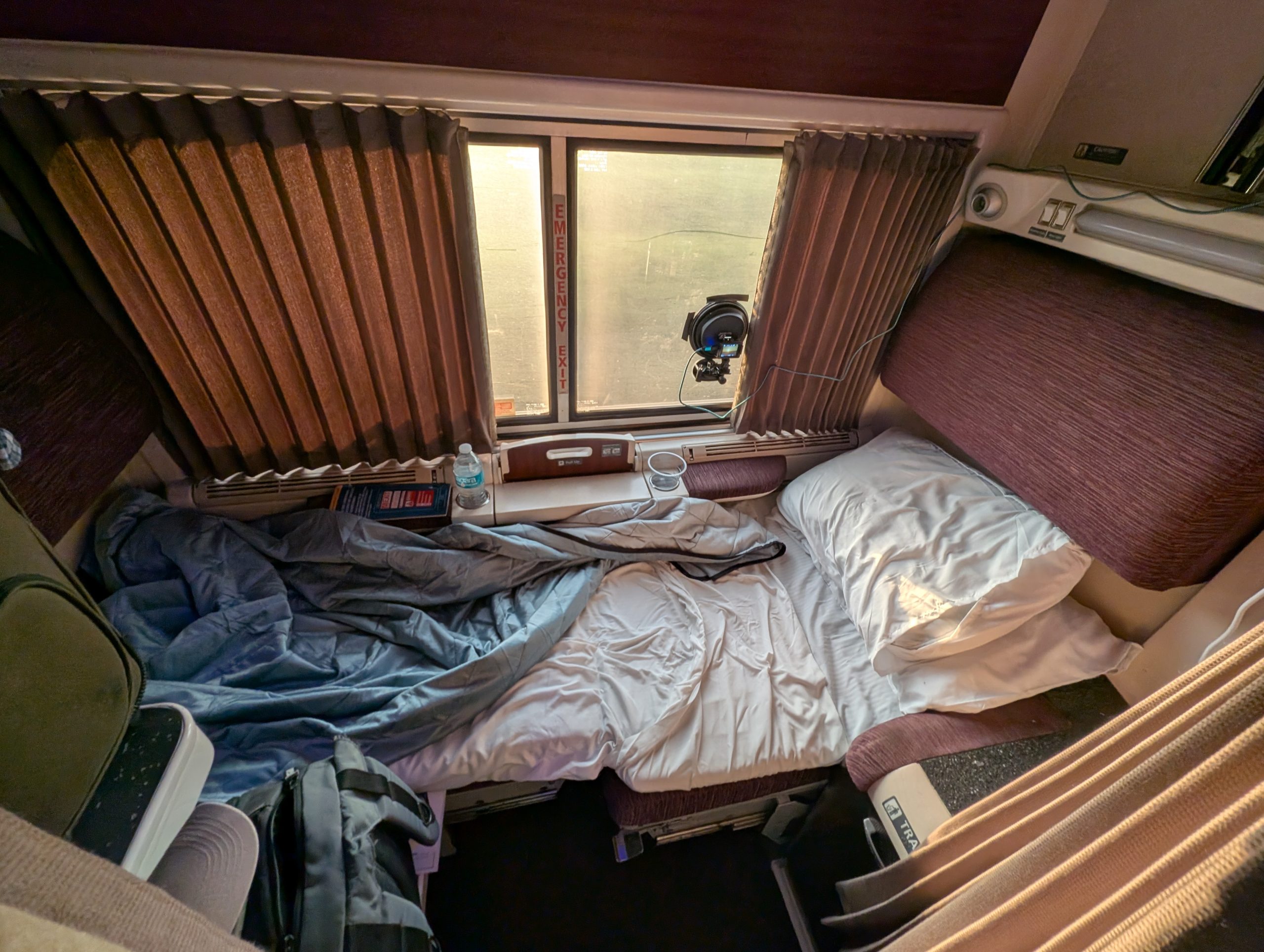 Amtrak roomette configured for sleeping.