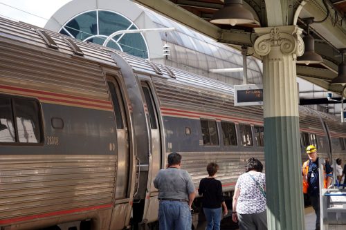 Passengers get some fresh air while the engine is changed.